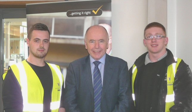 MP Jack Dromey meets Willmott Dixon apprentices Nathan Stait and Daniel Horton during the Employment & Training day at St Barnabas Church in Erdington