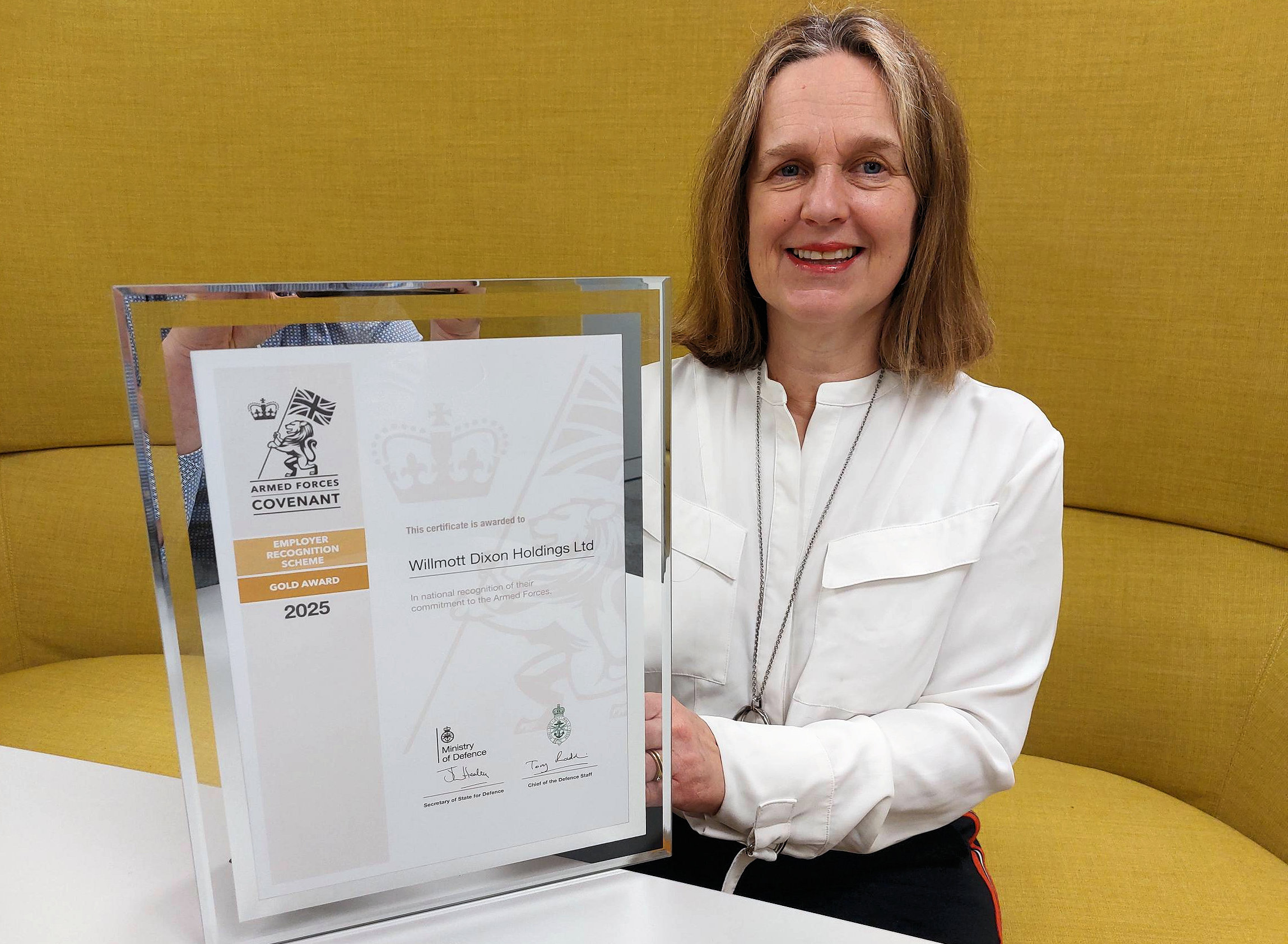 Clare with Covenant award two.jpg