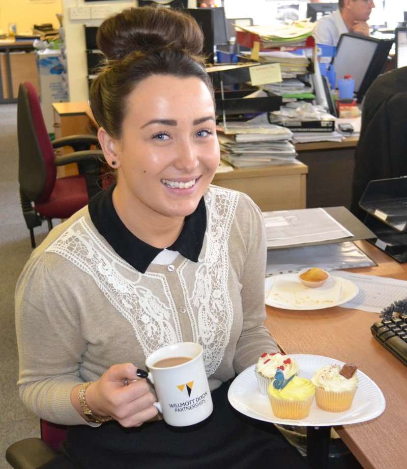 Willmott Dixon’s Customer Service Advisor Kerry Stanley supports the company’s coffee morning to raise funds for Macmillan Cancer Support